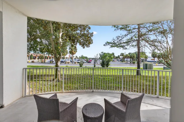 a balcony with furniture