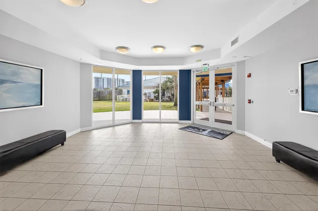a view of swimming pool with outdoor seating