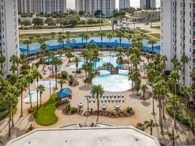 a aerial view of a balcony with chairs