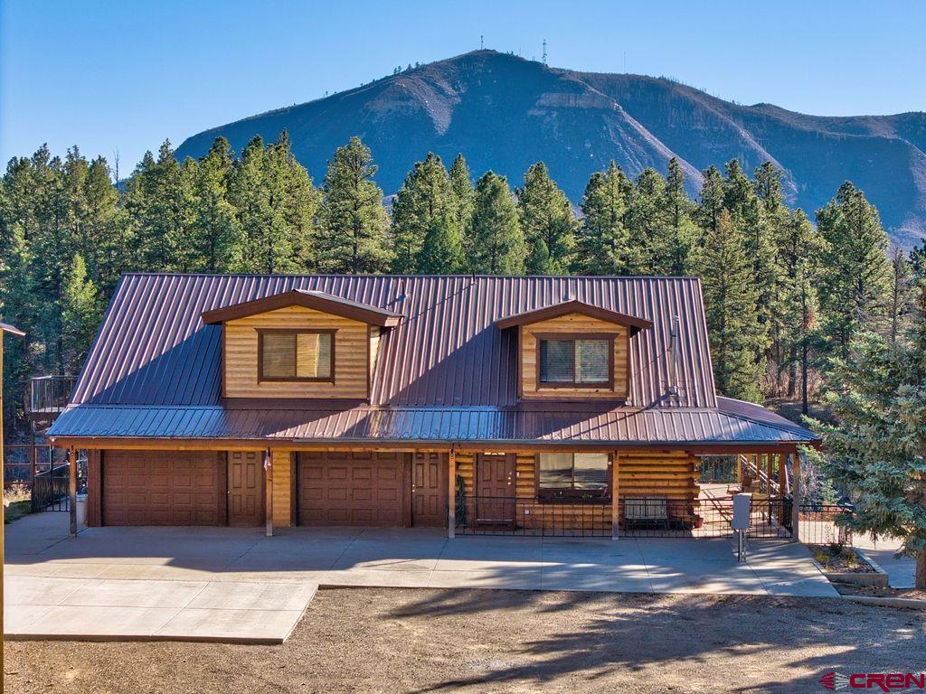 44750 Rd L Mancos, CO 81328 - Photo 1 of 45 a view of a house with a yard balcony and a trees
