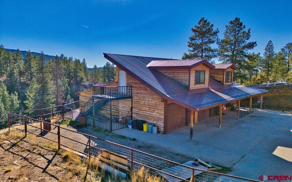 44750 Rd L Mancos, CO 81328 - Photo 13 of 45 a view of a chairs and table in the balcony