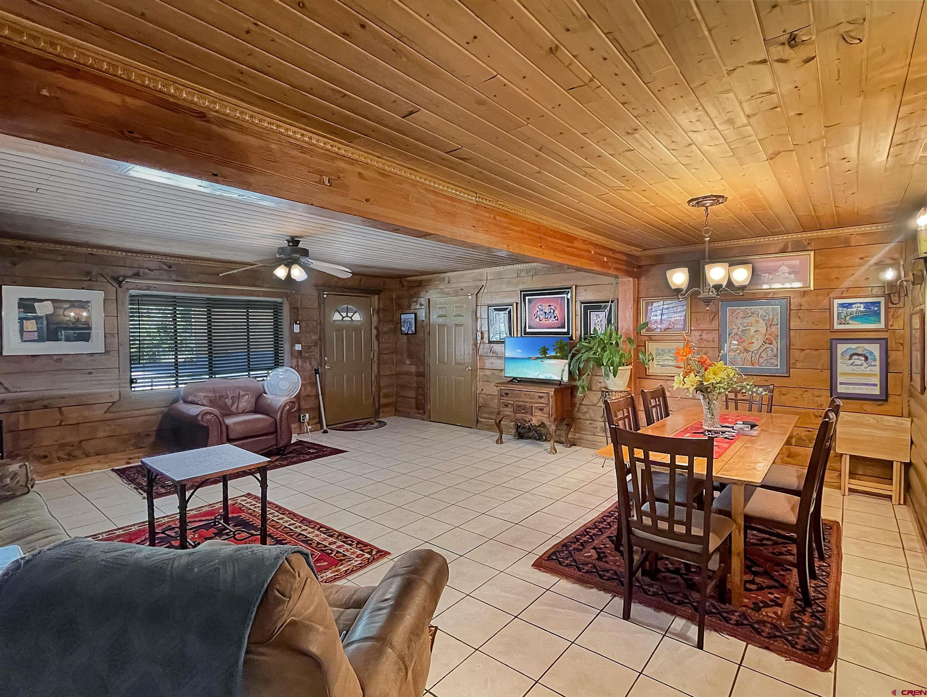 44750 Rd L Mancos, CO 81328 - Photo 17 of 45 a outdoor space with lots of chairs and chandelier