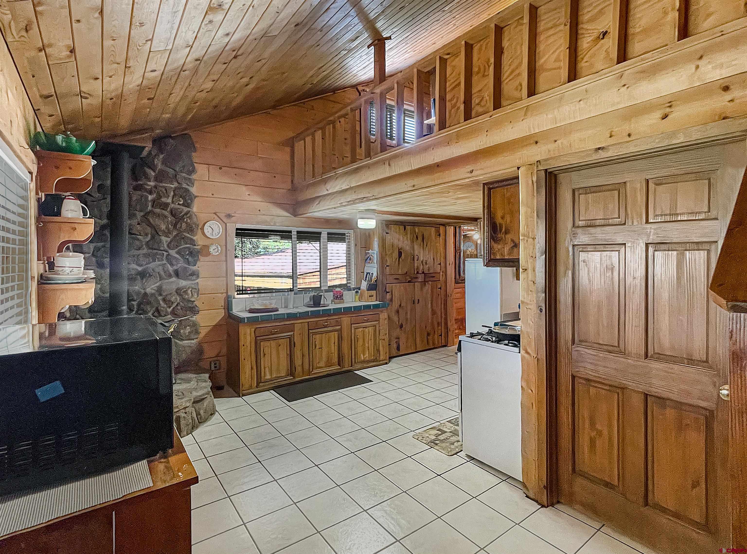 44750 Rd L Mancos, CO 81328 - Photo 2 of 45 a view of a kitchen with a refrigerator