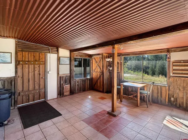 a view of a backyard of the house