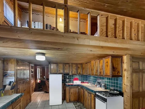 a bedroom with bed and a window