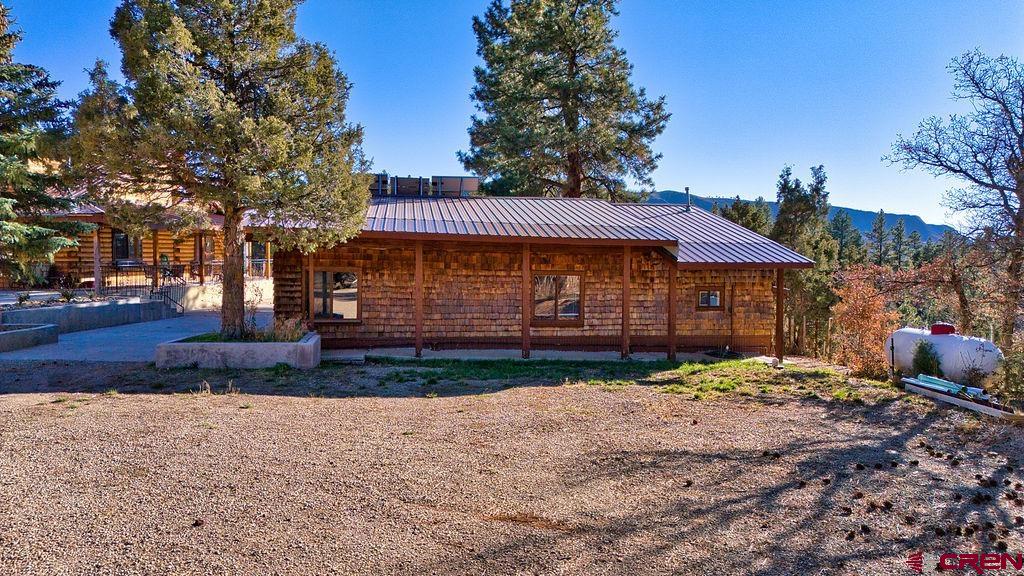44750 Rd L Mancos, CO 81328 - Photo 8 of 45 a view of a house with a yard