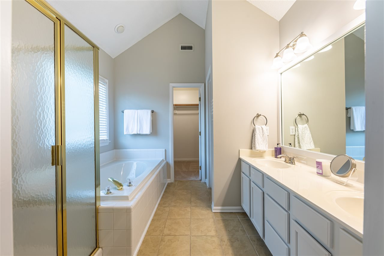 9212 Zermatt Court Raleigh, NC 27617 - Photo 15 of 30 Double vanity, garden tub and separate shower in the master bathroom. Master Bathroom