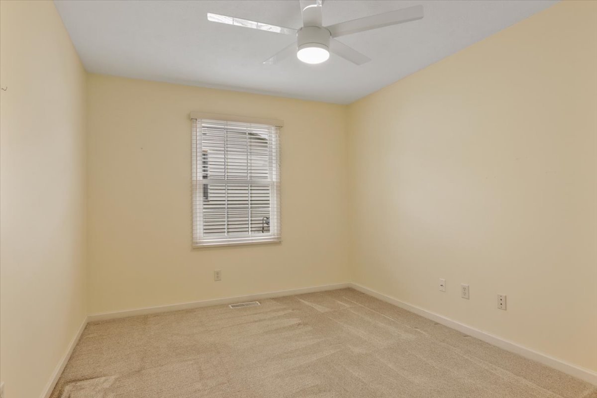 1707 Sunrise Point Normal, IL 61761 - Photo 14 of 23 an empty room with a window