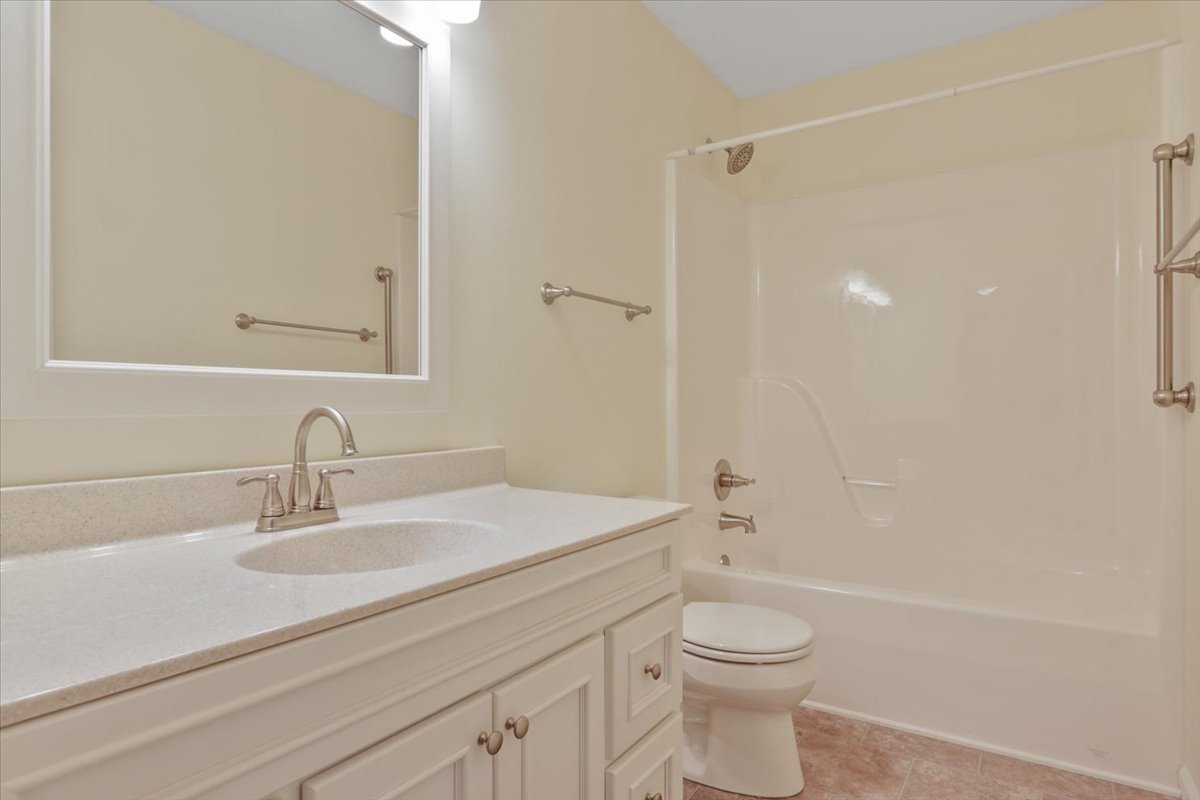 1707 Sunrise Point Normal, IL 61761 - Photo 15 of 23 a bathroom with a sink a toilet and shower
