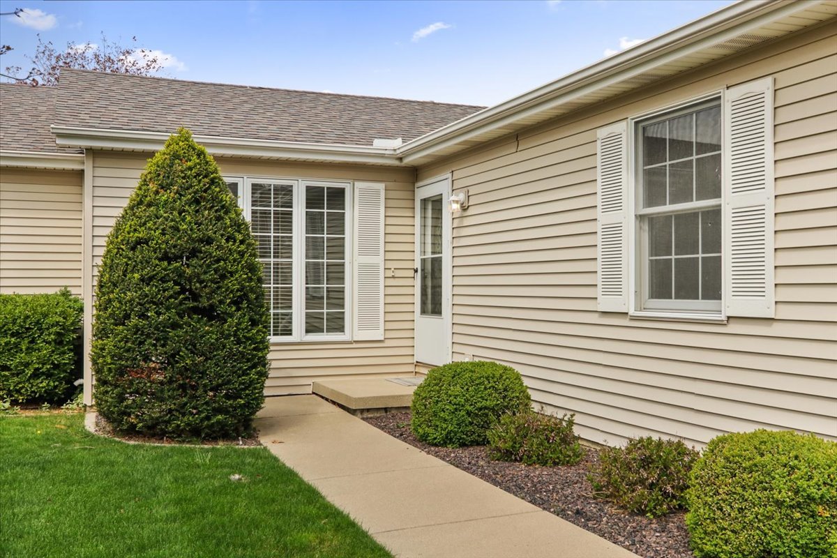 1707 Sunrise Point Normal, IL 61761 - Photo 4 of 23 a view of a house with a yard and plants