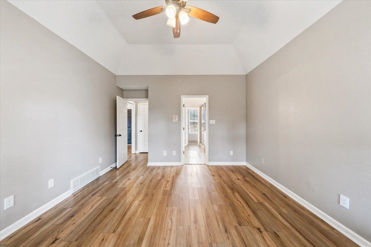 1279 River Ridge Drive Collierville, TN 38017 - Photo 12 of 28 wooden floor in an empty room with a window