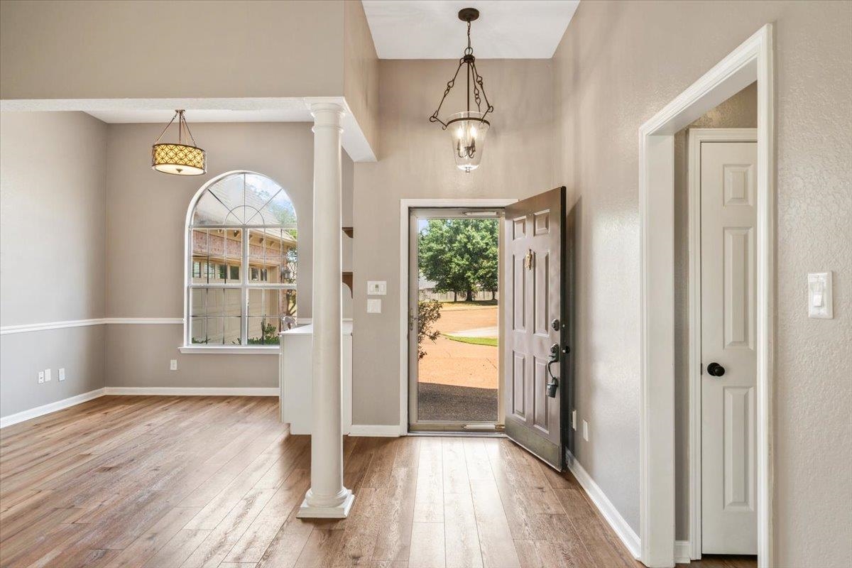 1279 River Ridge Drive Collierville, TN 38017 - Photo 5 of 28 a view of empty room with wooden floor and fan