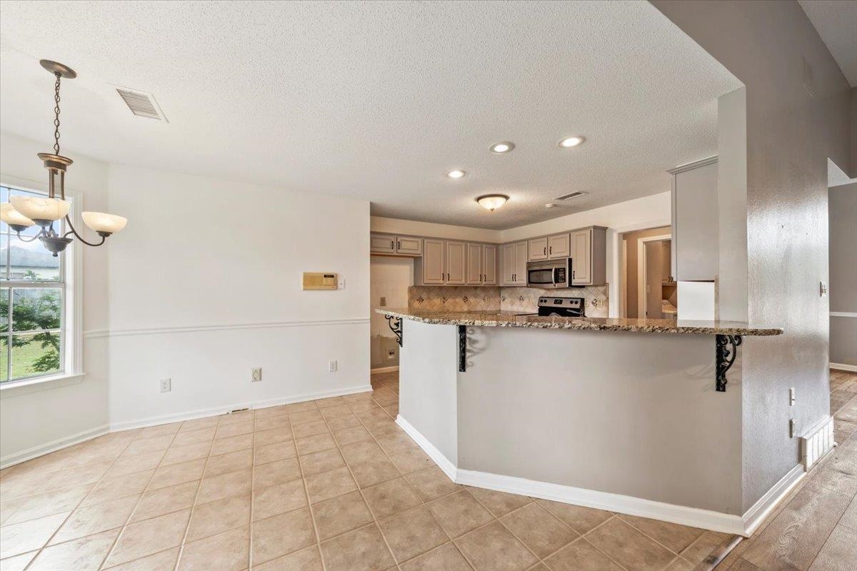 1279 River Ridge Drive Collierville, TN 38017 - Photo 7 of 28 a view of a kitchen with appliances