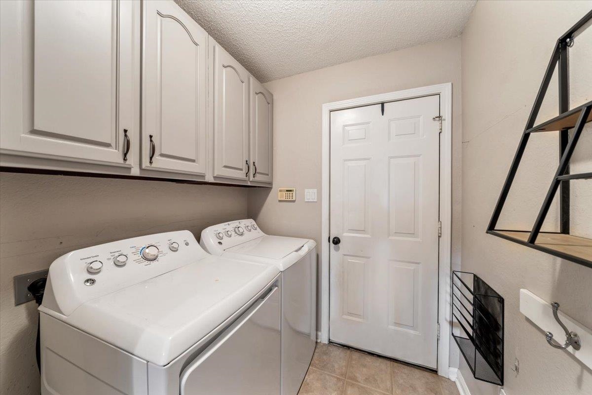 1279 River Ridge Drive Collierville, TN 38017 - Photo 10 of 28 a utility room with dryer and washer