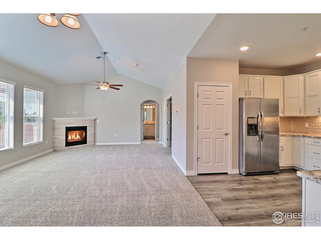 4672 West 20th Road, Unit 525 Greeley, CO 80634 - Photo 11 of 35 a view interior of a house an entryway and fire place