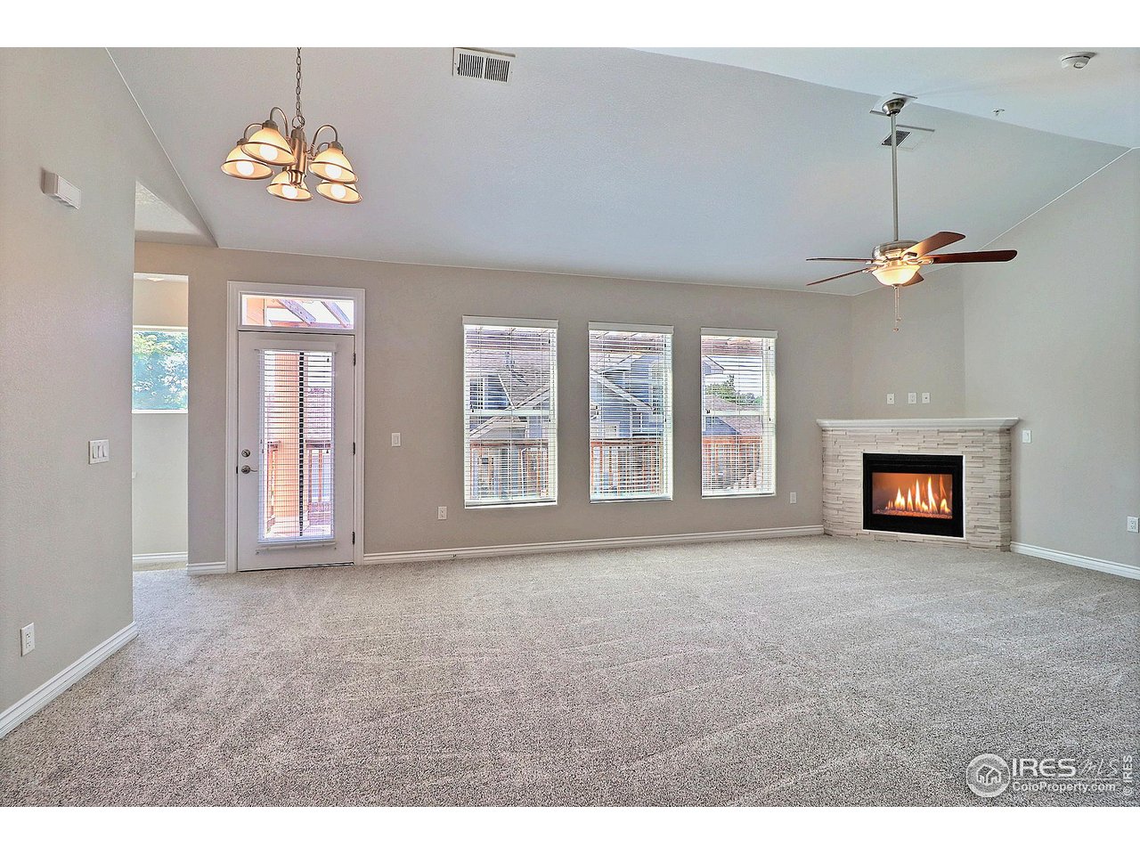 4672 West 20th Road, Unit 525 Greeley, CO 80634 - Photo 6 of 35 a view of an empty room with a window