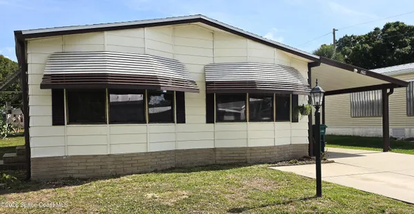 $1,750 | 259 South Dolphin Circle, Barefoot Bay, FL 32976