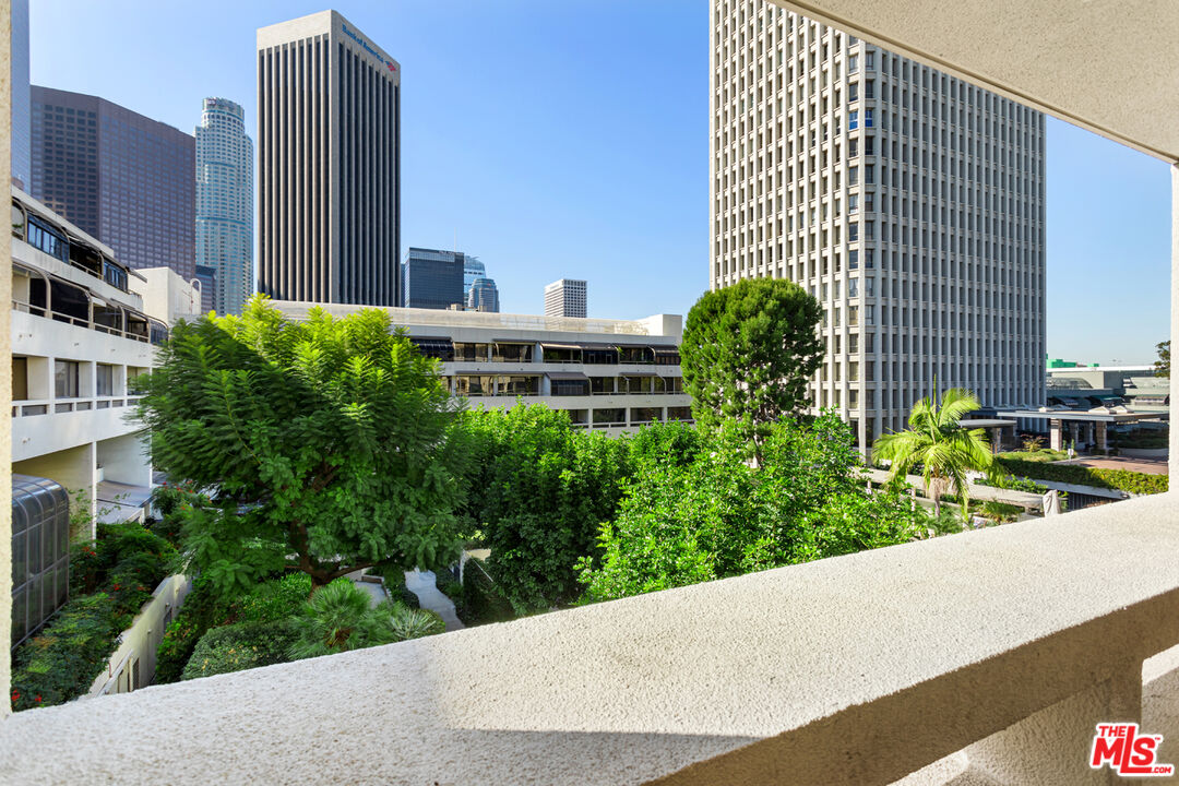 121 South Hope Street, Unit 320 Los Angeles, CA 90012 - Photo 1 of 26 a view of balcony with garden