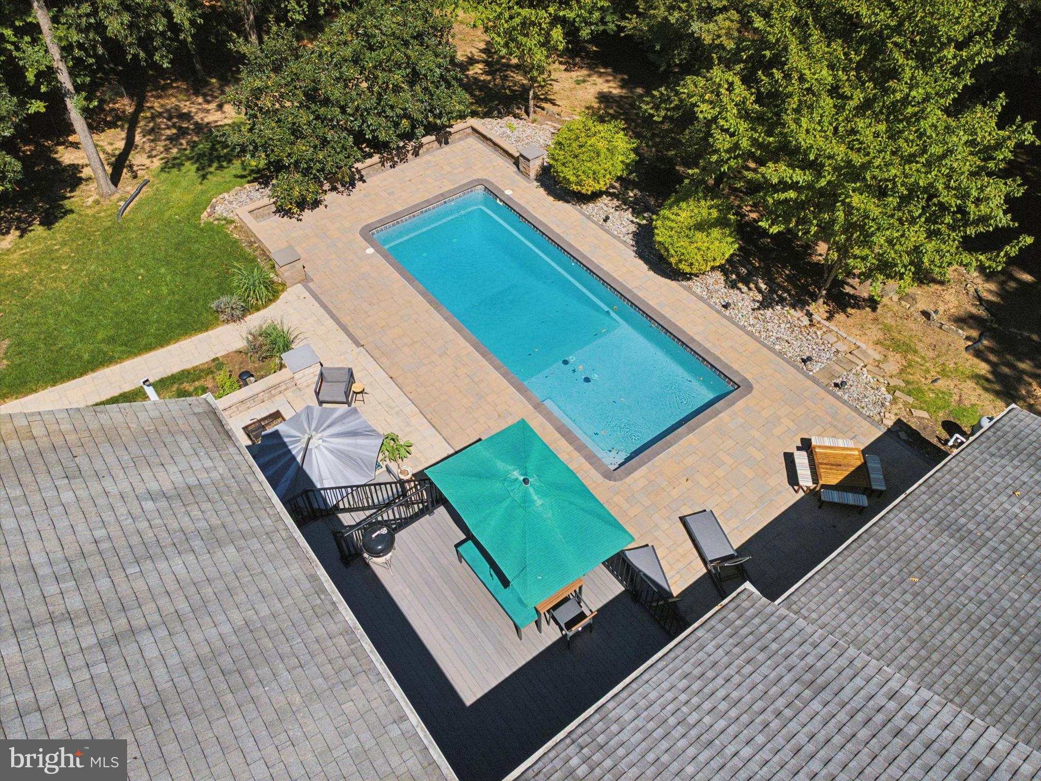 570 Fletcher Road Wayne, PA 19087 - Photo 17 of 54 a view of a tennis ground with large trees