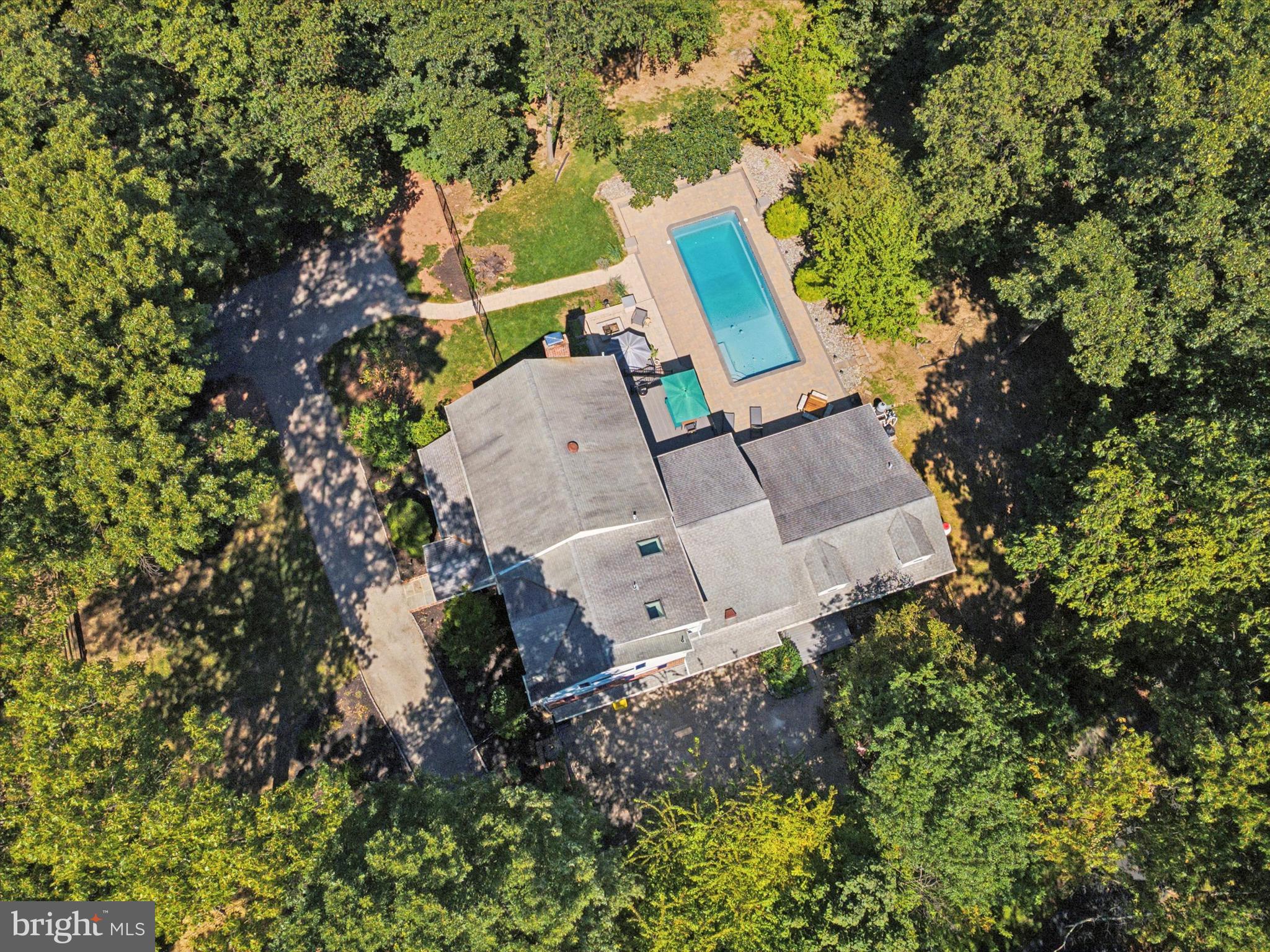 570 Fletcher Road Wayne, PA 19087 - Photo 19 of 54 an aerial view of a house with a yard and garden