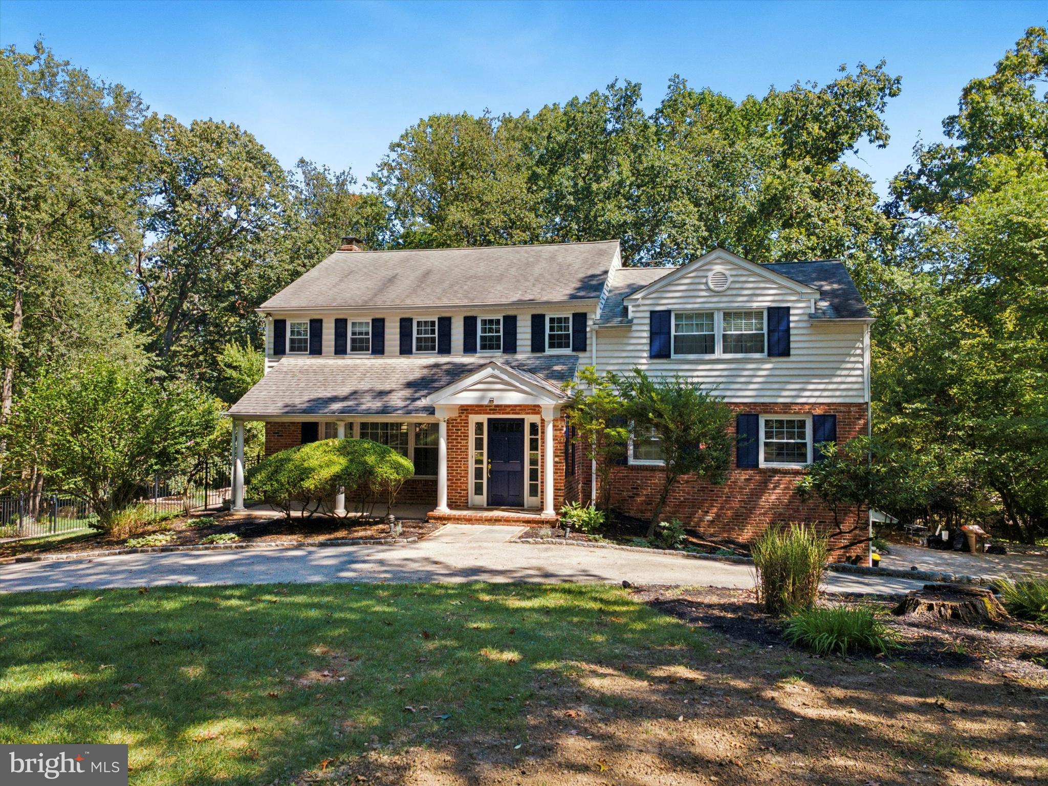 570 Fletcher Road Wayne, PA 19087 - Photo 2 of 54 a front view of a house with a yard