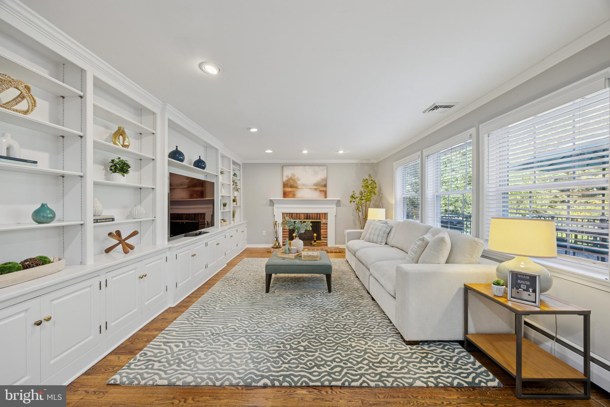 570 Fletcher Road Wayne, PA 19087 - Photo 26 of 54 a living room with furniture wooden floor and flat screen tv