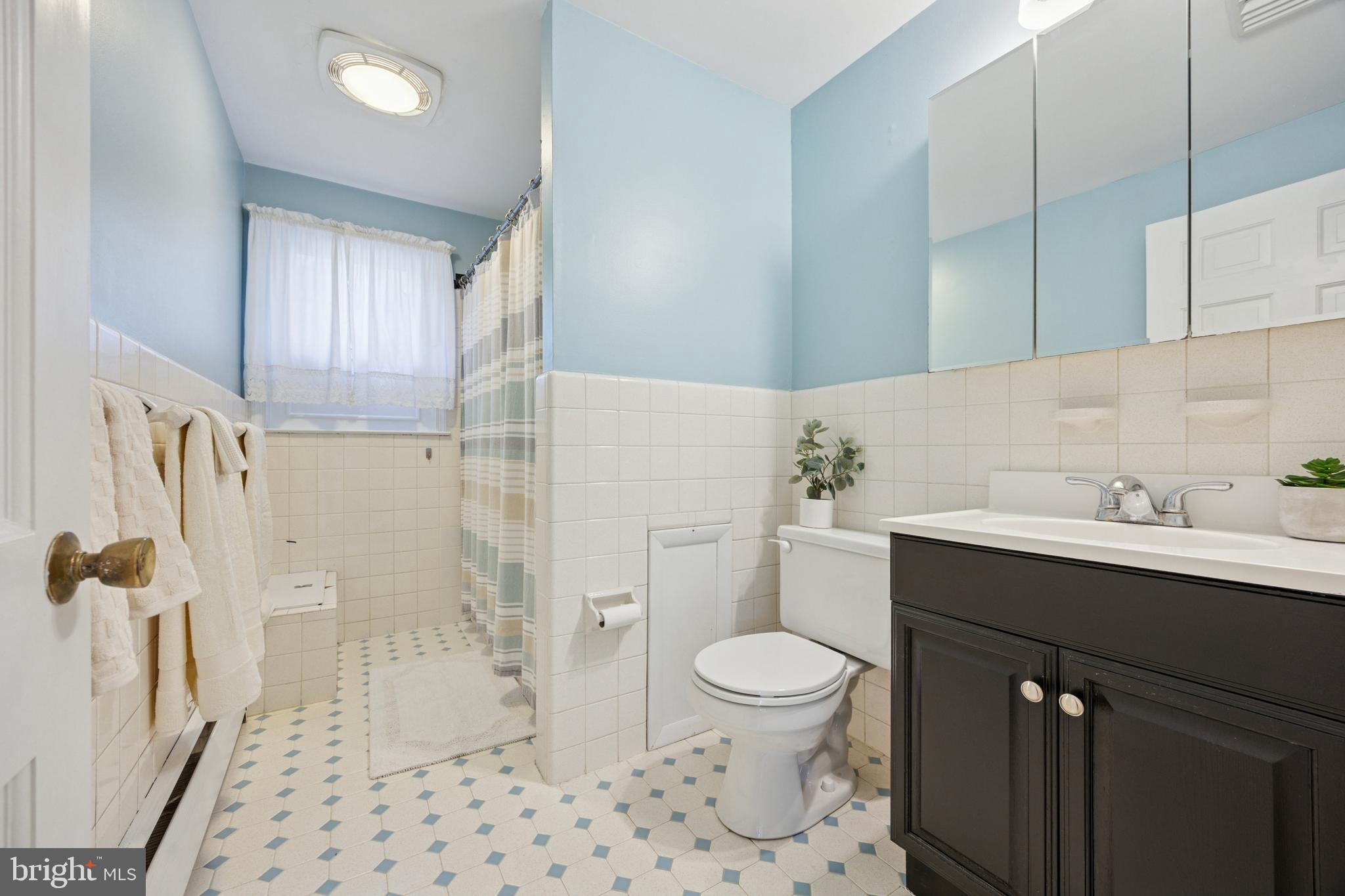 570 Fletcher Road Wayne, PA 19087 - Photo 48 of 54 a bathroom with a sink toilet and shower