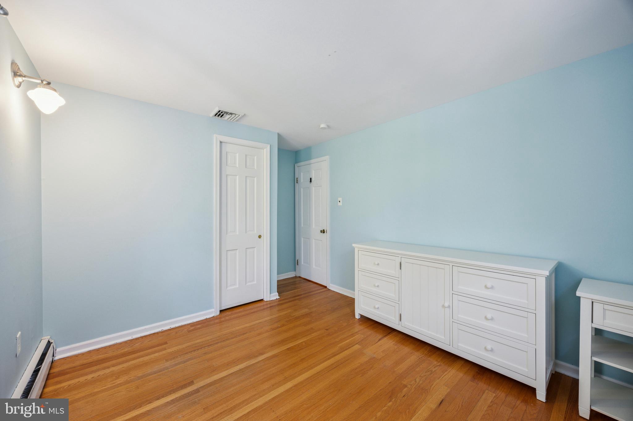 570 Fletcher Road Wayne, PA 19087 - Photo 49 of 54 a view of a room with wooden floor