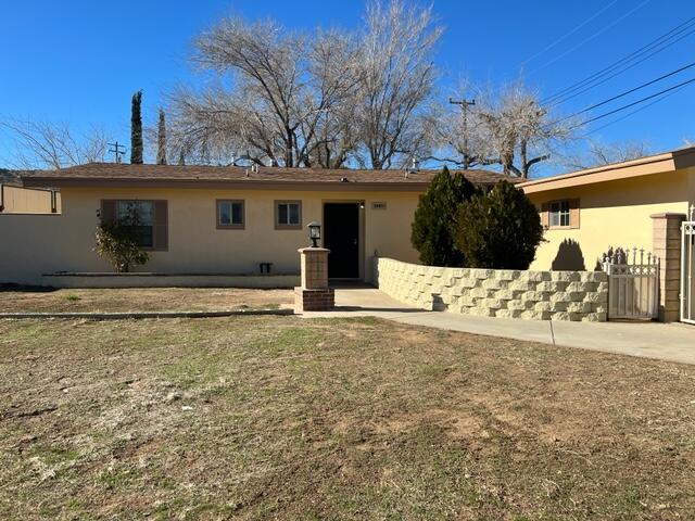 a view of a backyard of the house