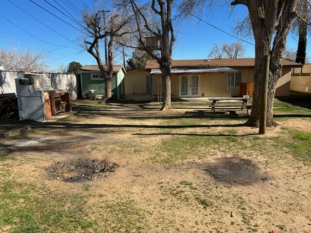 38879 Mesquite Road Palmdale, CA 93551 - Photo 12 of 12 a view of a house with a yard