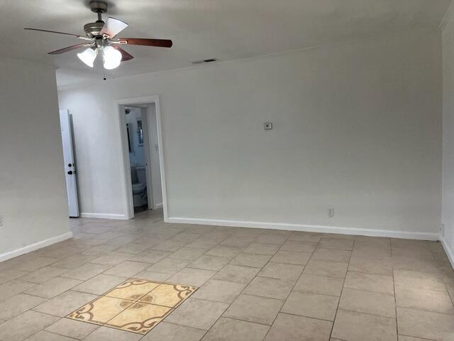 38879 Mesquite Road Palmdale, CA 93551 - Photo 5 of 12 a view of an empty room with chandelier fan