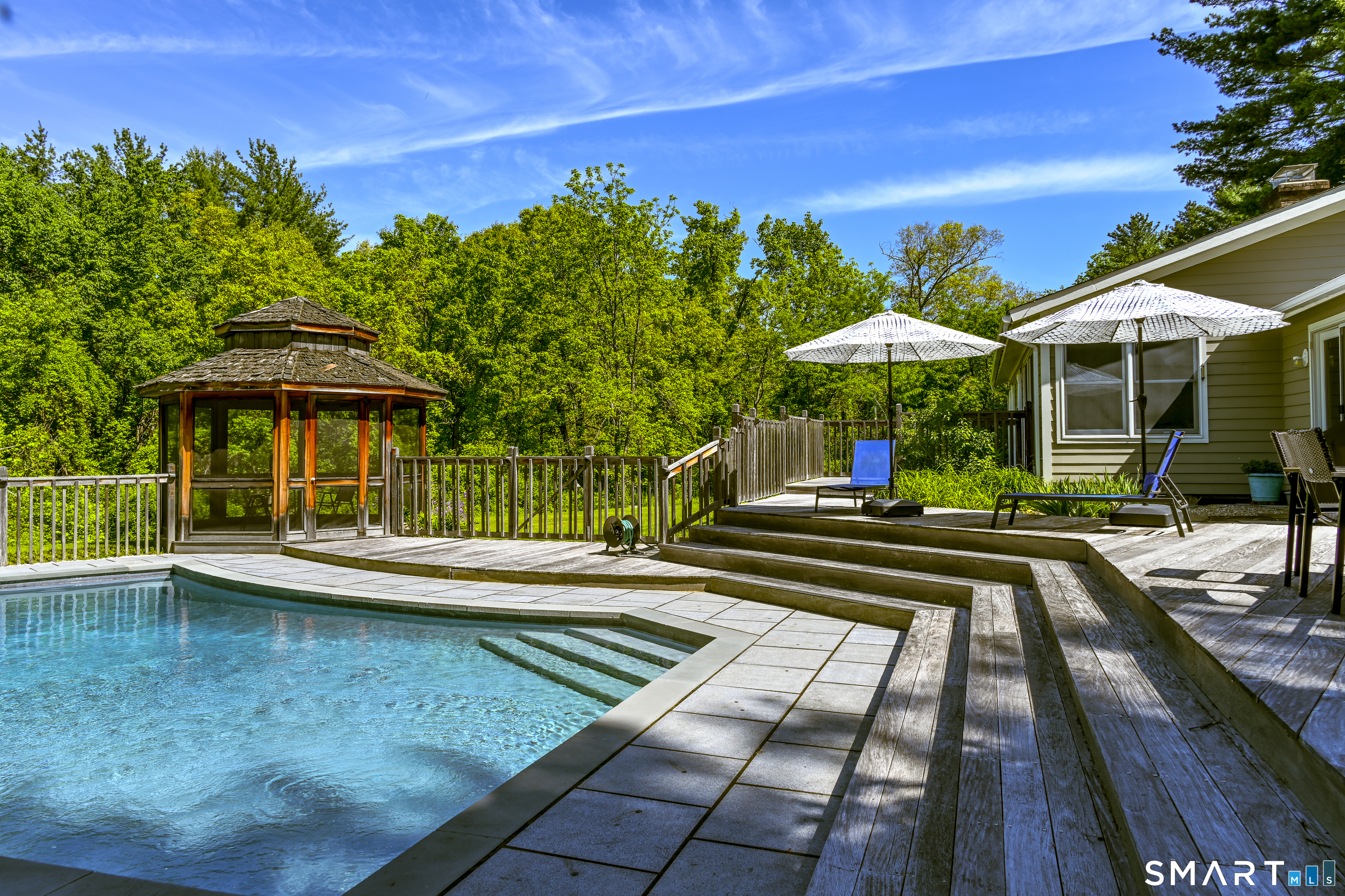 7 Chimney Rock Road Kent, CT 06757 - Photo 1 of 35 a view of swimming pool with chairs and umbrella