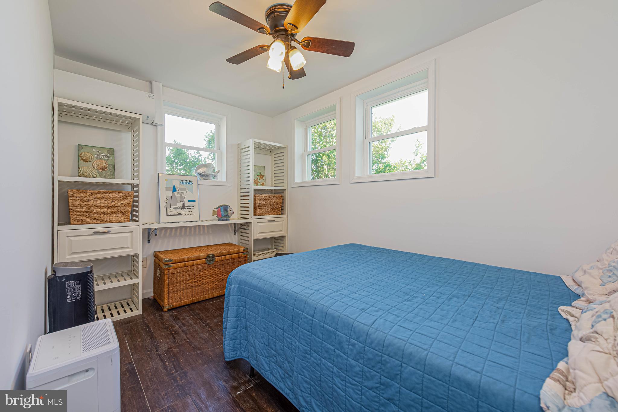 11152 Roland Parks Road Deal Island, MD 21821 - Photo 18 of 42 a bedroom with a bed and a desk