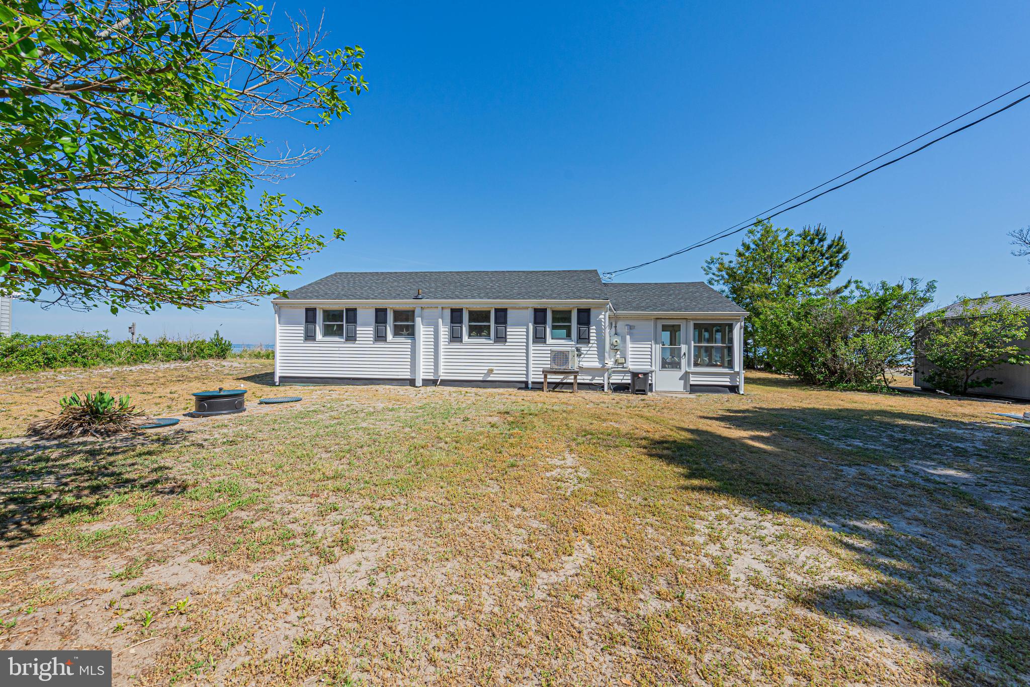 11152 Roland Parks Road Deal Island, MD 21821 - Photo 26 of 42 a view of house with outdoor space and swimming pool