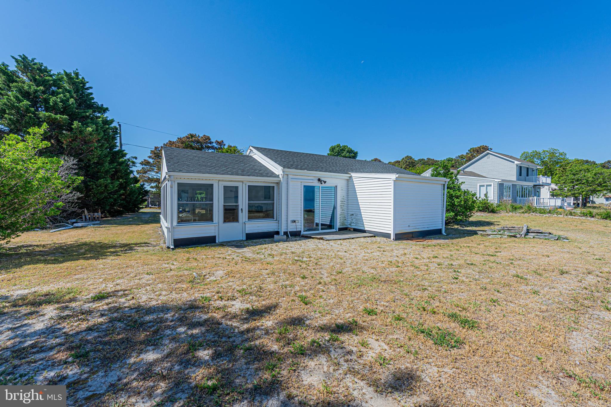 11152 Roland Parks Road Deal Island, MD 21821 - Photo 27 of 42 a front view of a house with a yard