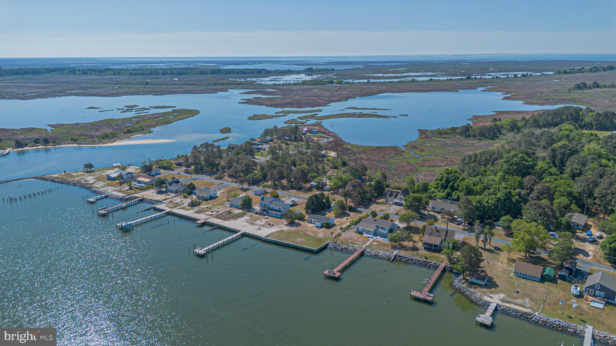 11152 Roland Parks Road Deal Island, MD 21821 - Photo 33 of 42 an aerial view of ocean and residential houses with outdoor space