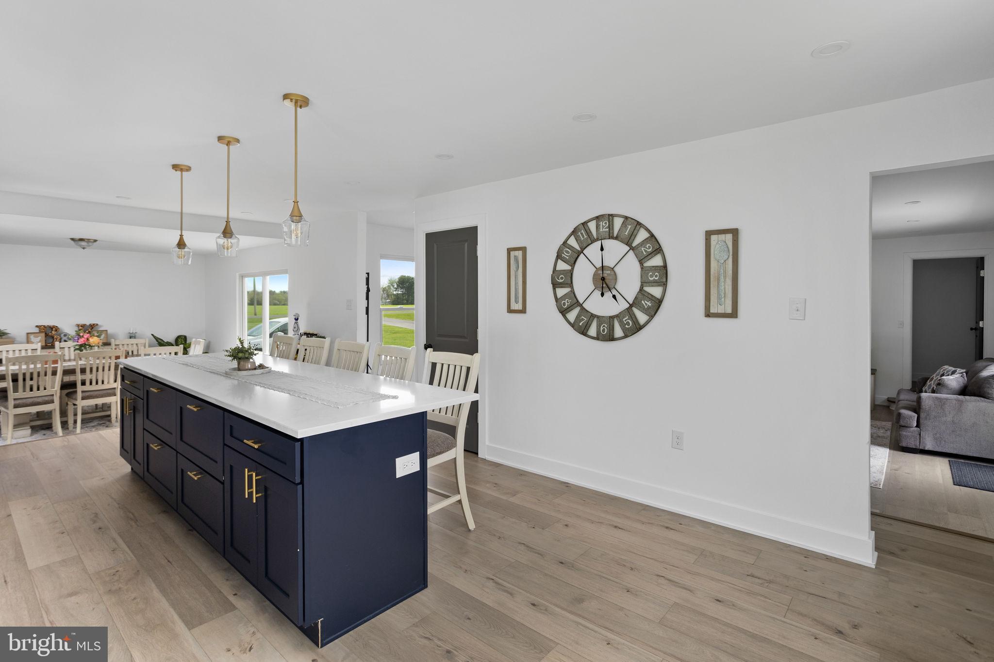 11 Bridge Road Lumberton, NJ 08048 - Photo 12 of 38 a kitchen with kitchen island wooden cabinets and sink