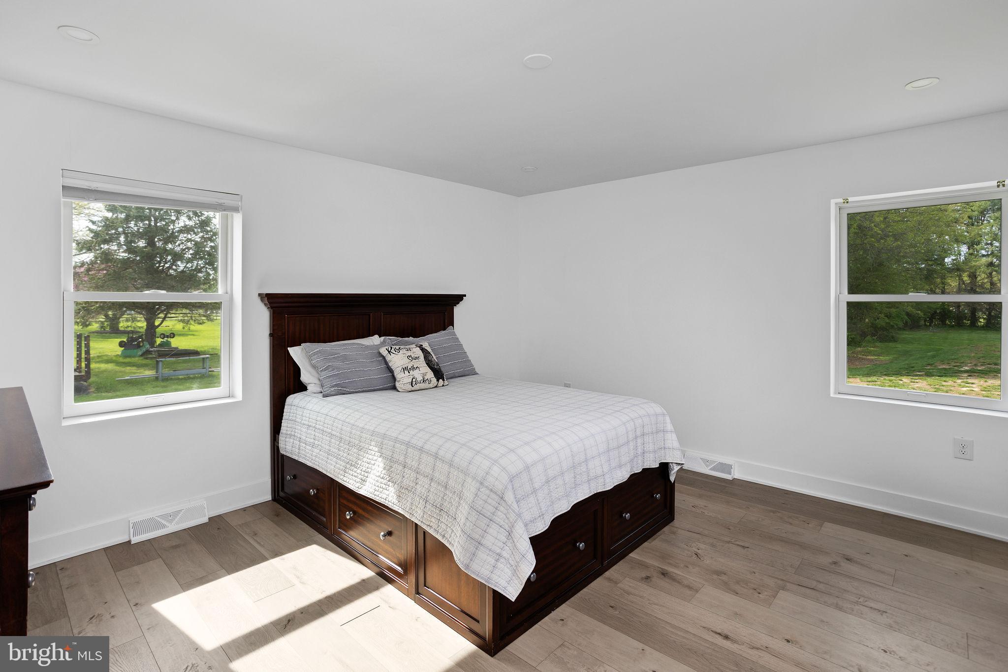 11 Bridge Road Lumberton, NJ 08048 - Photo 20 of 38 a bed sitting in a bedroom next to a window