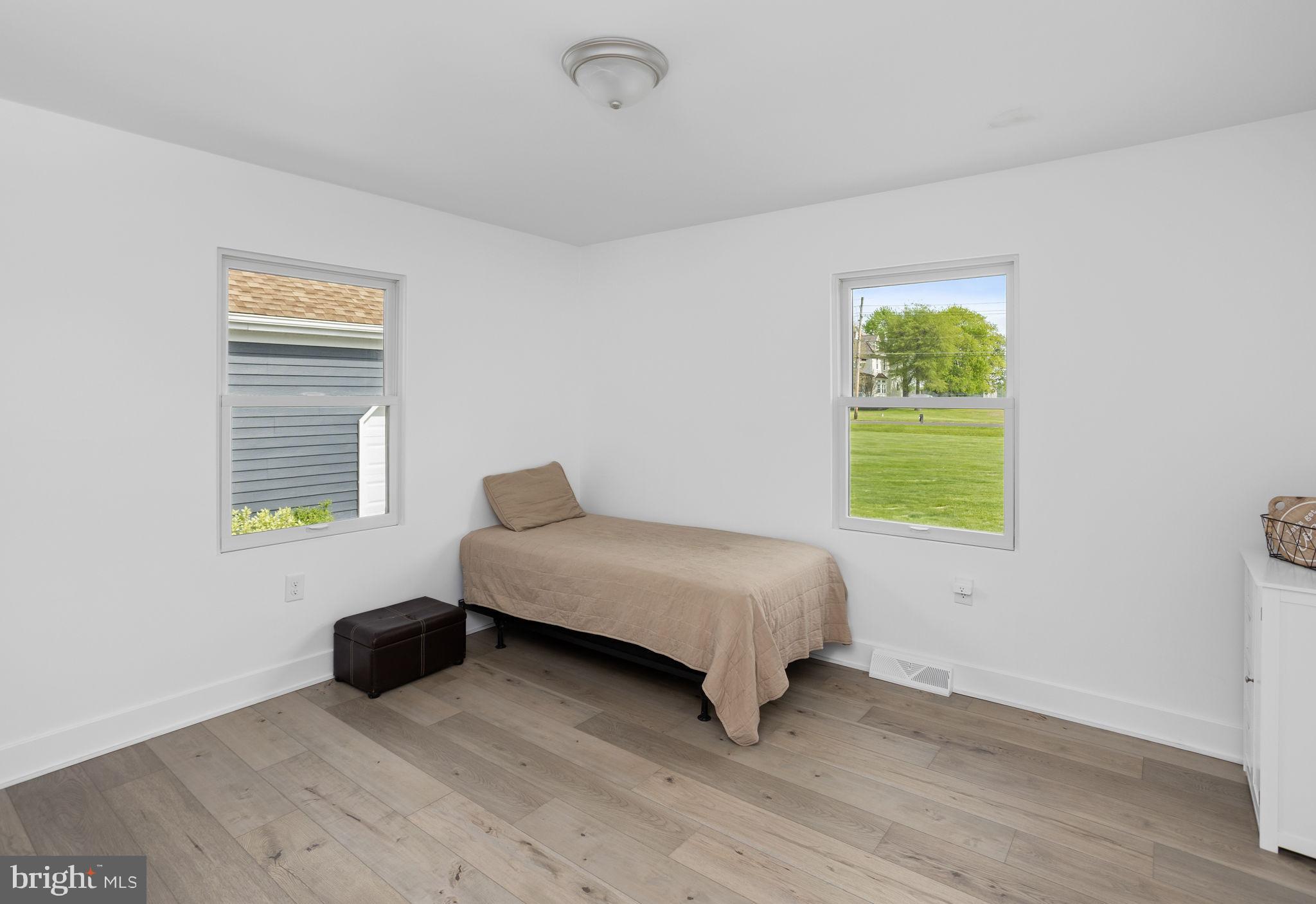 11 Bridge Road Lumberton, NJ 08048 - Photo 24 of 38 a living room with a bed furniture and a window
