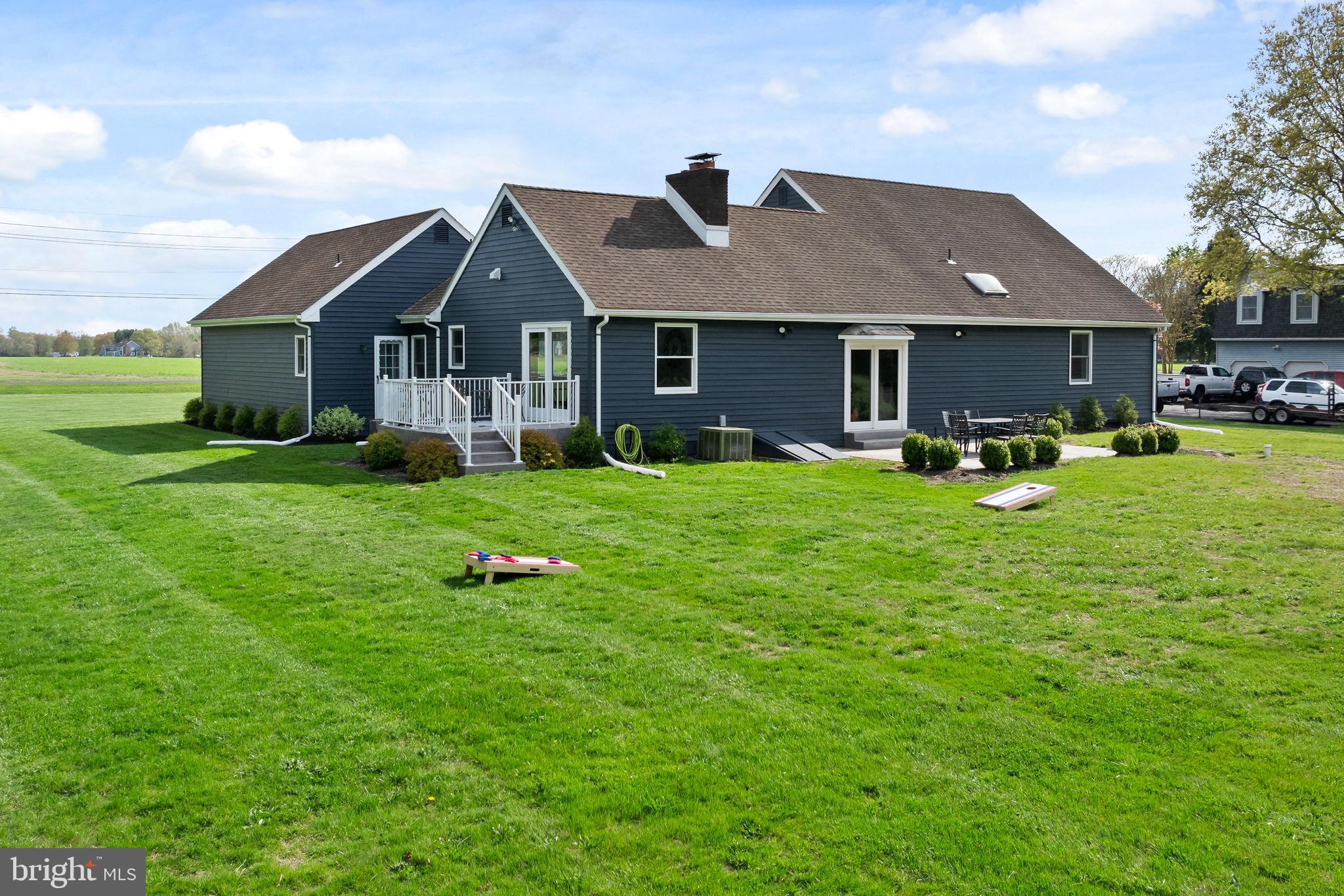 11 Bridge Road Lumberton, NJ 08048 - Photo 30 of 38 a front view of a house with a yard and sitting area