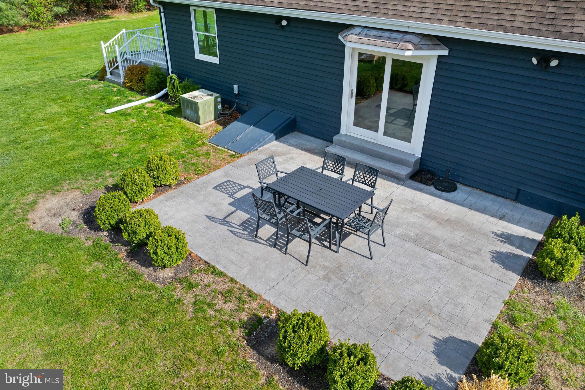 11 Bridge Road Lumberton, NJ 08048 - Photo 32 of 38 a view of backyard of house with seating area