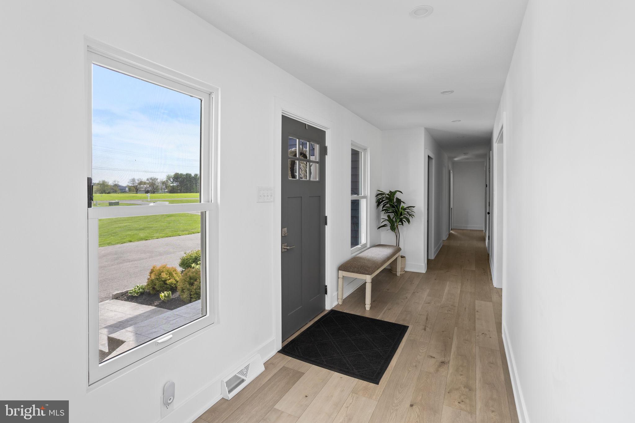 11 Bridge Road Lumberton, NJ 08048 - Photo 6 of 38 a view of a hallway with a dining room view