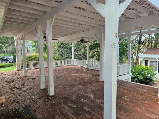 a view of a porch with a backyard