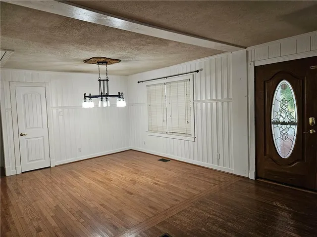 a view of a hallway with entryway