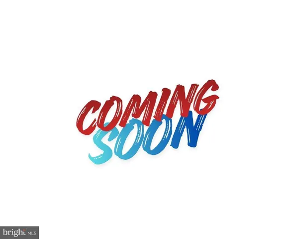 a view of a room with a white wall