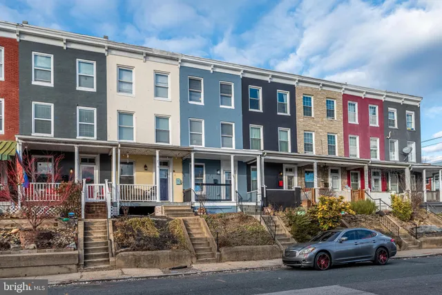 a car parked in front of a building