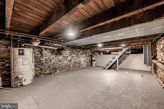 a view of empty room with lot of storage