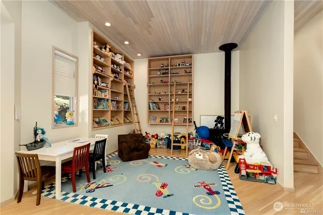a living room with furniture and next to a window