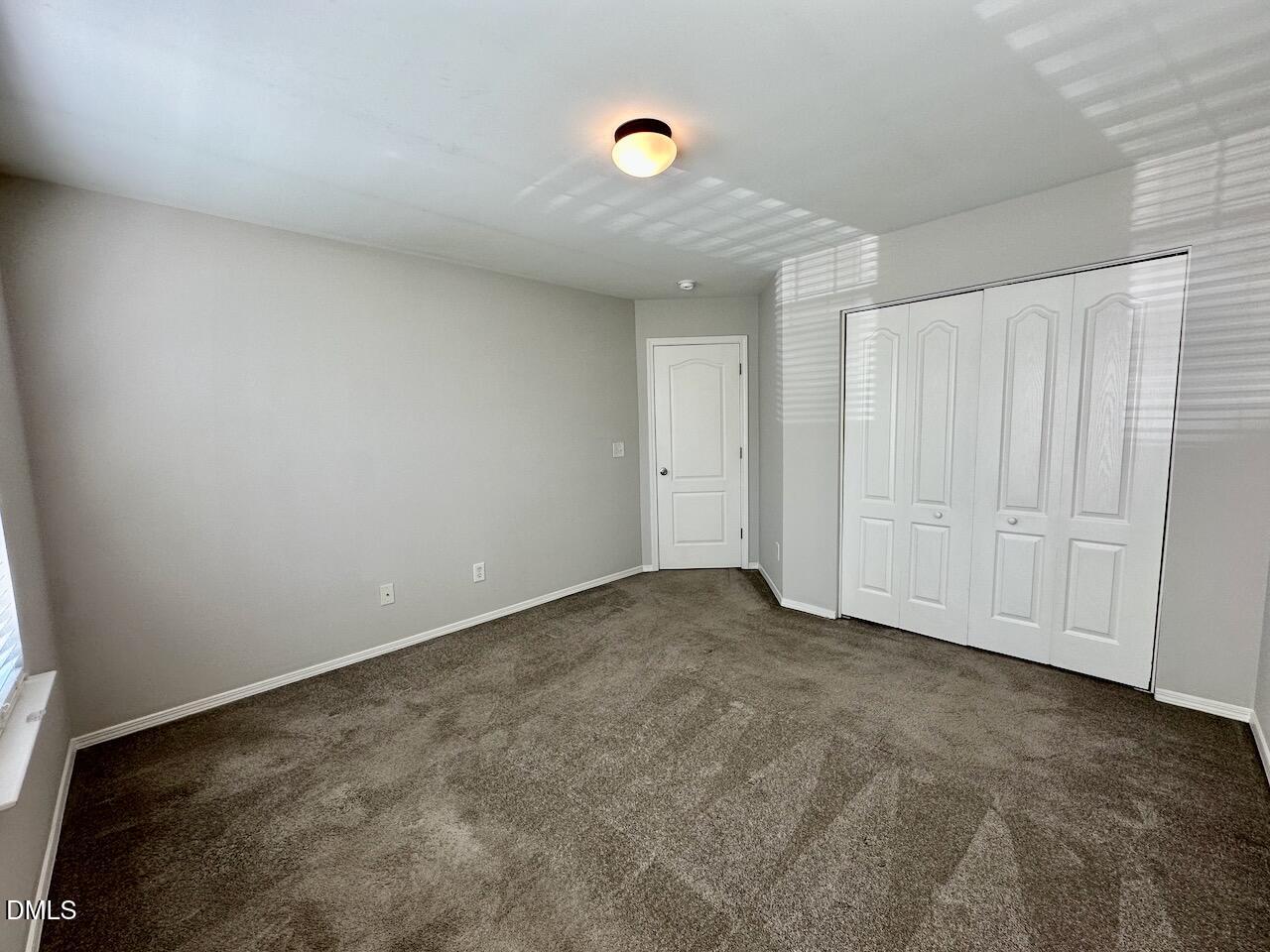 8208 Stone Cellar Drive Raleigh, NC 27613 - Photo 28 of 34 a view of an empty room