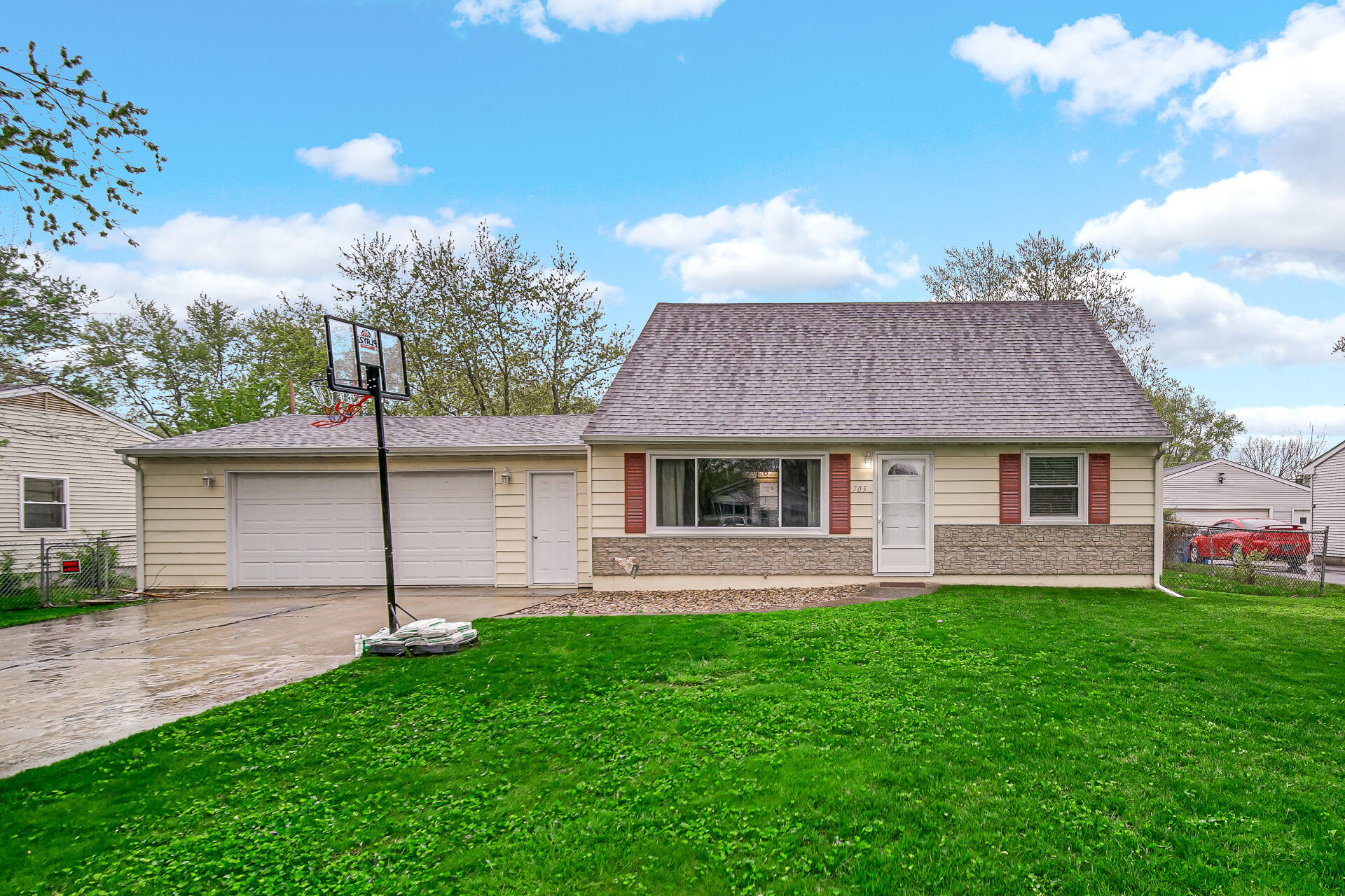 705 Juniper Road Valparaiso, IN 46385 - Photo 1 of 21 a view of a house with a yard and a garden